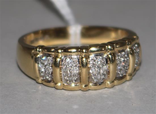 A 14ct gold and diamond gentlemans ring, with five panels of four small diamonds in claw settings